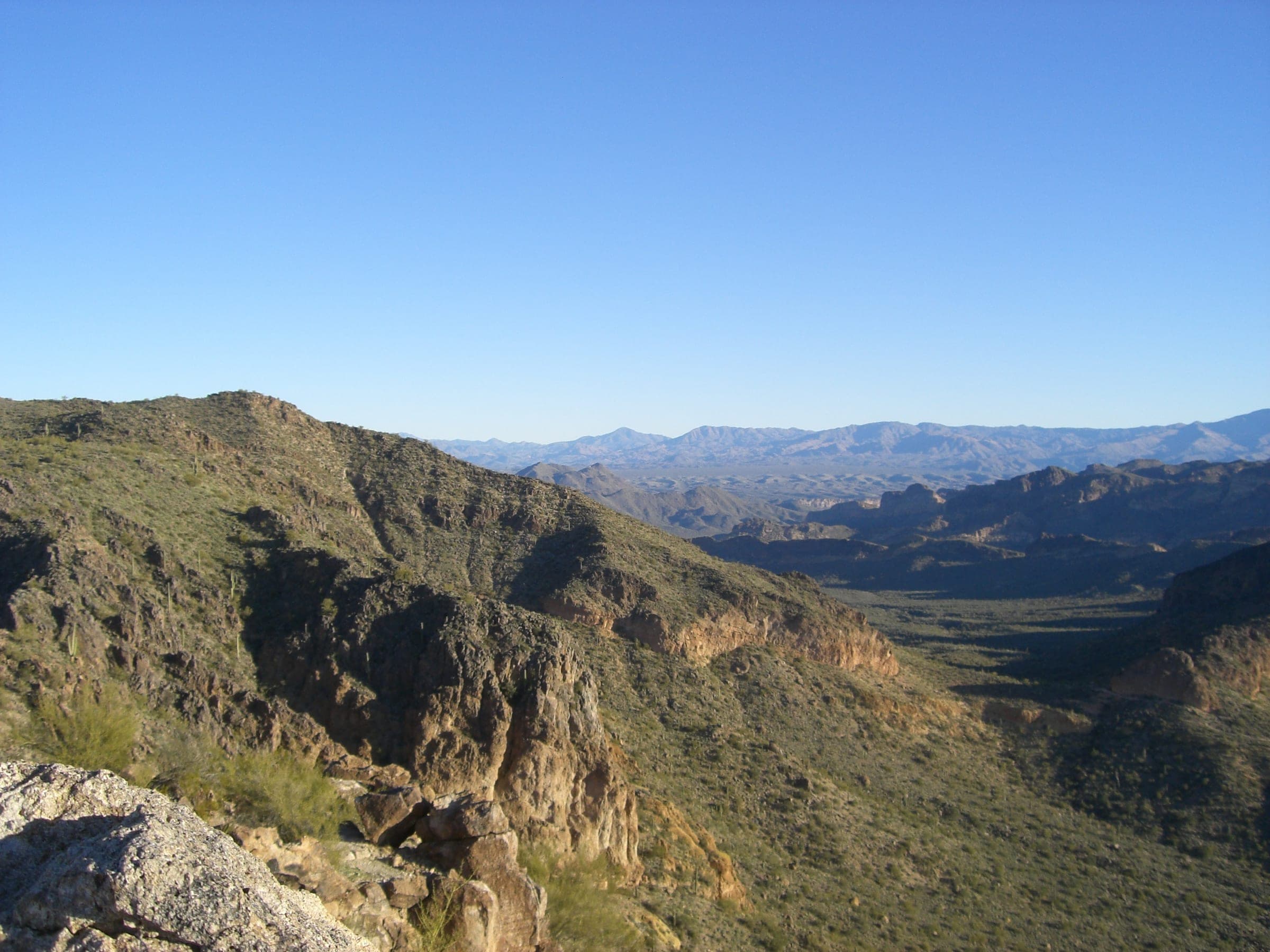 Green desert ridges and canyons of the Tonto National Forest seen from the top of the Usery Mountains