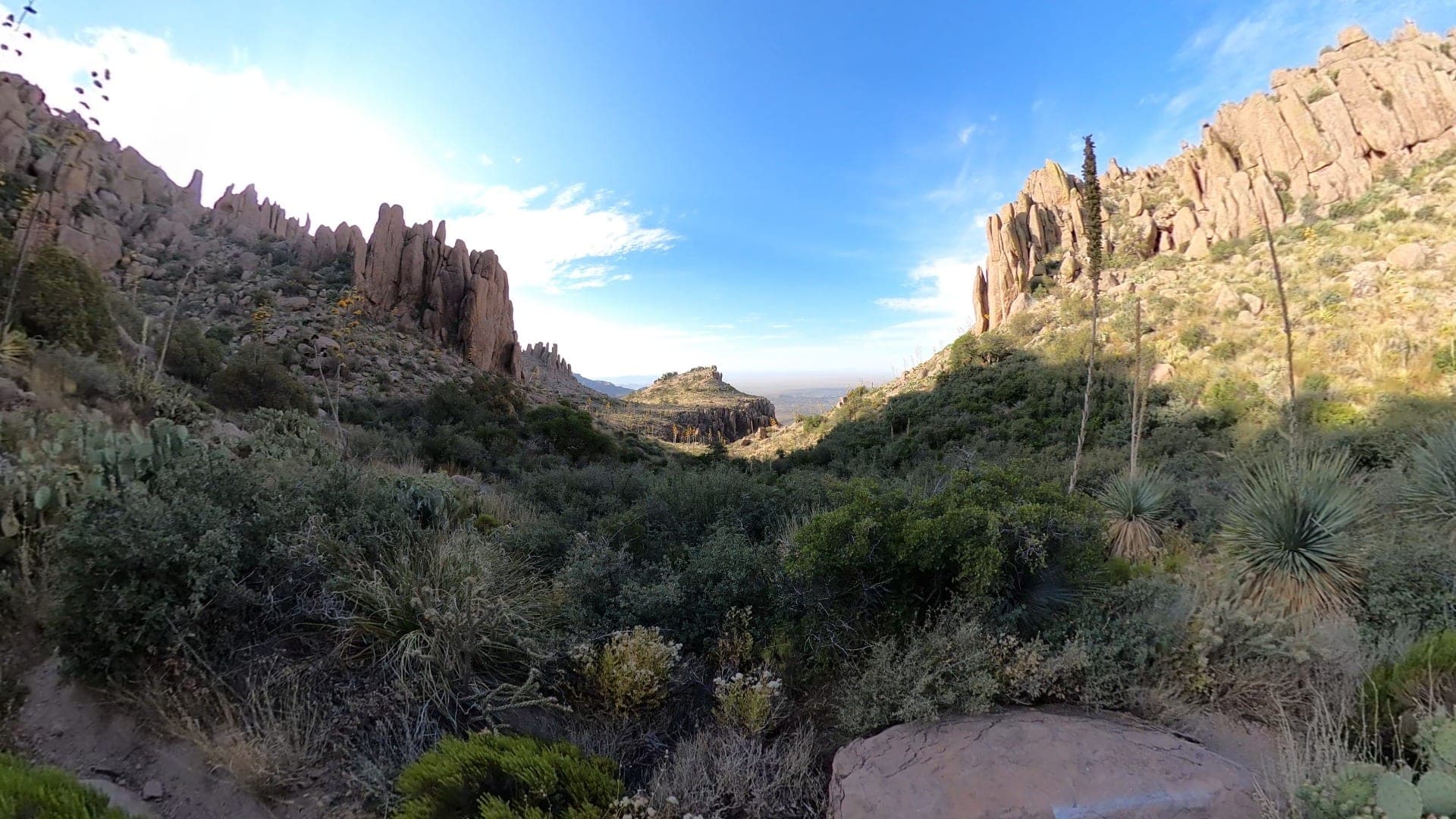 Hoodoos and rock spires on both sides of the Superstition Ridgeline Trail near Ironview Peak, looking east