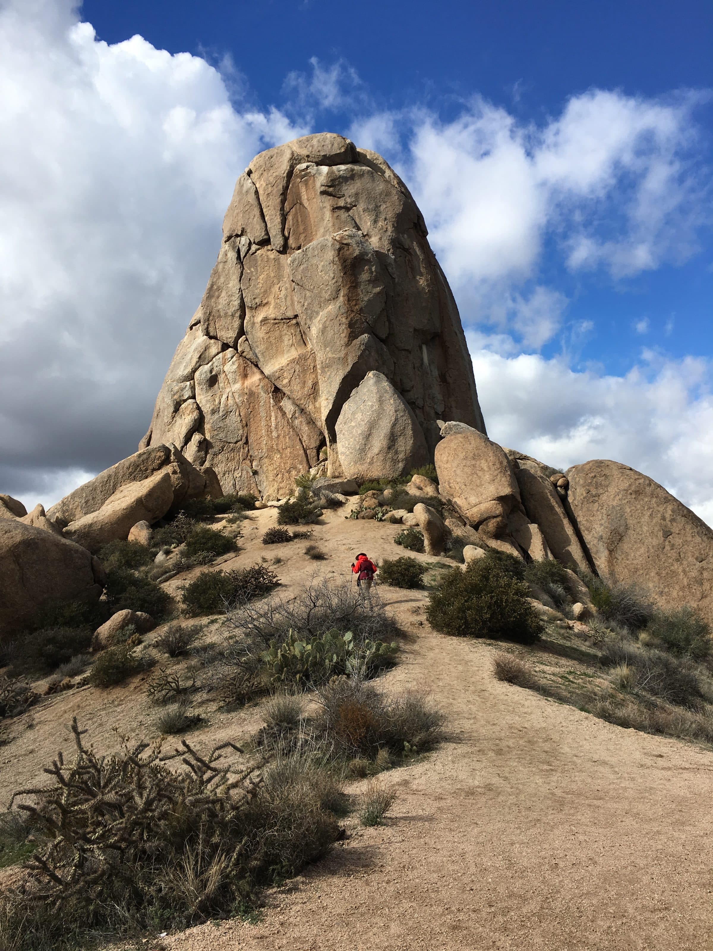 Tom's Thumb, a granite tower rising above boulders in the McDowell Mountains